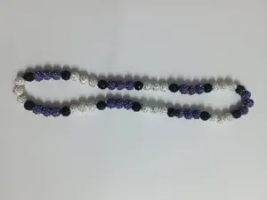 Detail of 10mm purple, black, and AB white clay rhinestone Shamballa bead necklace