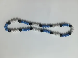 Detailed view of 10mm blue, white, and black rhinestone clay beads shamballa necklace set