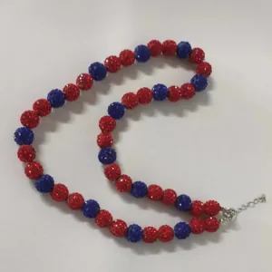 Detailed view of 10mm red and blue shamballa rhinestone disco ball bead necklace