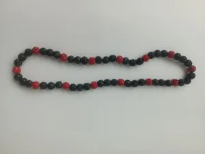 Close-up view of 10mm Shambhala necklace with alternating black and red rhinestone beads