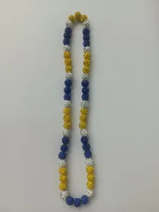 Close-up of 10mm blue, yellow and white Shamballa bead necklace on white background