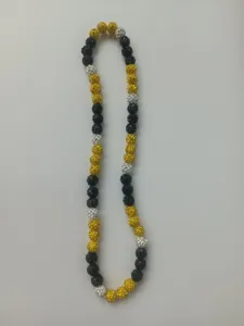 Detailed view of 10mm gold, black and silver Shamballa disco ball bead necklace