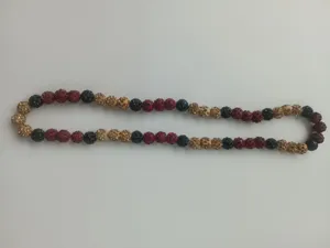 Detailed view of 10mm colorful disco ball beads on a Shamballa elastic necklace