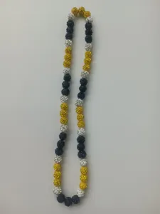 Close-up of 10mm black, gold, and silver rhinestone clay ball Shamballa necklace