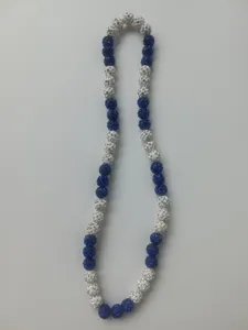 Detailed macro view showing blue and white 10mm Shamballa disco ball beaded necklace.