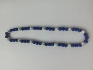 Detail view of Shamballa style necklace with 10mm blue and white disco ball beads