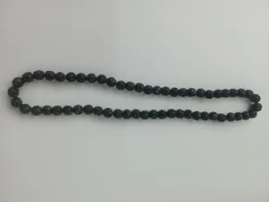 Detailed view of 10mm black textured clay bead necklace for hip-hop style fashion