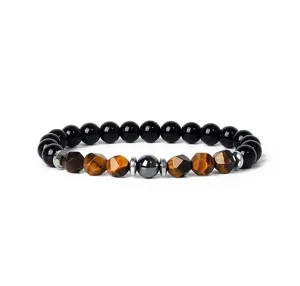 Detailed close-up view of beaded bracelet featuring tiger eye stones and black elements.