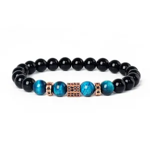 8mm blue tiger eye and black stone beaded bracelet with rose gold zircon spacer beads detail shot.