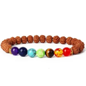 7mm rudraksha and chakra gemstone bead bracelet detail close-up, colorful yoga prayer beads.
