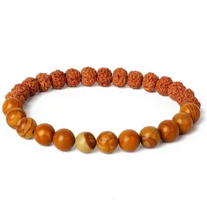 Detailed view of wooden rudraksha and colorful stone beaded bracelet spiritual jewelry