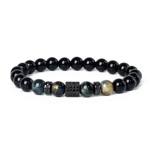 Detailed view of the beaded bracelet showcasing blue tiger eye stones and cubic zirconia spacers.