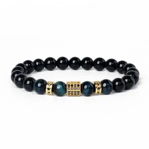 Detailed view of the beaded bracelet with blue tiger eye and cubic zirconia spacer beads.
