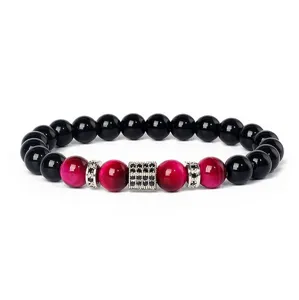 Close-up detail of beaded bracelet with pink tiger eye and micro-paved cubic zirconia