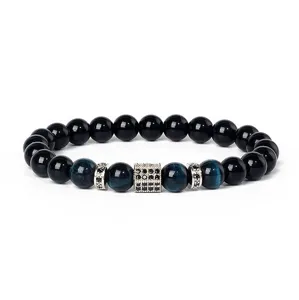 Detail view of beaded bracelet with blue tiger eye stone and micro-paved cubic zirconia spacers.