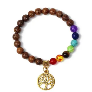 Yoga chakra bracelet with wooden beads and tree of life pendant for meditation and healing energy.