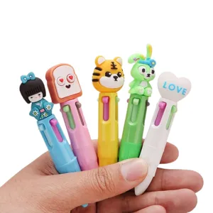 Cute mini 4-color ballpoint pens set with cartoon toppers, perfect for students and journaling.