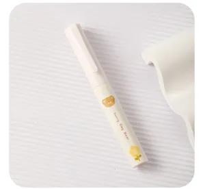 Compact pen-shaped portable scissors detail view, mini student craft tool with safety design.