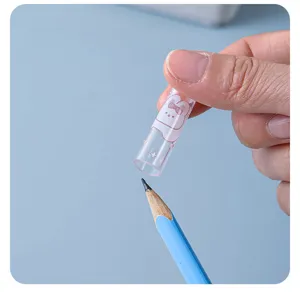 Close-up detail shot of a transparent plastic pencil cap with cute cartoon pattern, ideal protector.