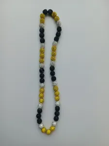 Detailed close-up view of 10mm Shamballa disco ball beads in black, gold and silver colors