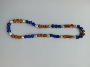 Detailed view of Shambhala necklace featuring blue, silver, and orange 10mm disco beads.