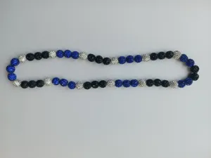 Macro view of 10mm blue black and silver Shamballa clay disco ball beads necklace