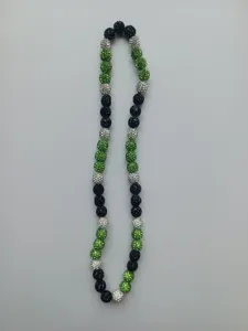 Close-up detail of a 10mm Shamballa drill ball beaded necklace in green black and silver