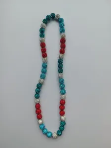Macro view of 10mm red white and blue rhinestone clay Shamballa bead necklace detail