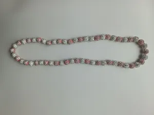 Detail view of 10mm pink and white Shamballa rhinestone disco ball beads