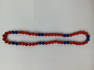 Detailed view of red and blue Shamballa clay bead necklace featuring sparkling rhinestones