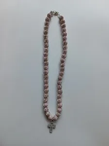 Close-up detail of a stunning 10mm rhinestone clay bead necklace featuring a sparkling cross pendant.