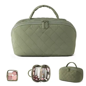 Large capacity quilted cosmetic bag with multi-compartment interior and clear pouch