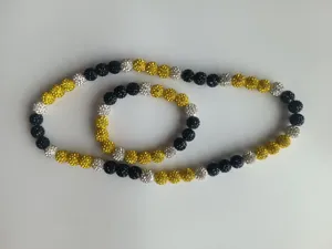 Handmade Shamballa jewelry set with 10mm crystal pavé clay beads in yellow, black and silver
