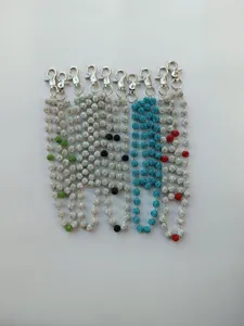 Sparkling rhinestone pave ball pants chains with metal clasps, stylish punk waist accessories.