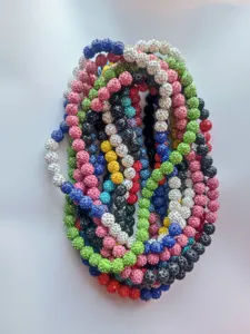 Detailed view of assorted colorful 12mm AB rhinestone clay bead shamballa necklaces