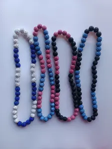 Detailed view of 12mm AB clay rhinestone ball Shamballa necklaces in four color styles