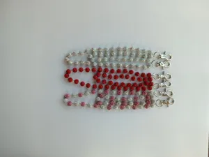 Detailed view of sparkly rhinestone disco ball pants chain, punk style waist chain accessory.