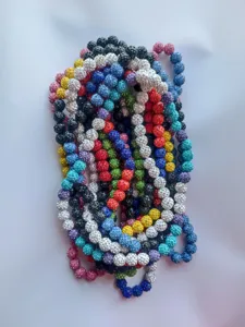 Macro detail of multi-color 12mm rhinestone clay beads for Shamballa necklaces.