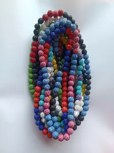 Close-up of 12mm colorful AB clay rhinestone Shamballa beads in various vibrant colors