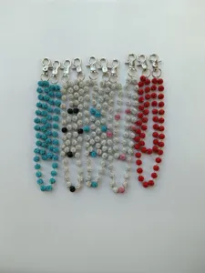 Detailed view of sparkly 8mm rhinestone Shamballa ball pocket chains and stylish waist chains.