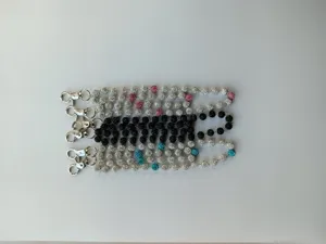 Detailed view of sparkly rhinestone shamballa bead pants chains, punk waist chain accessories.