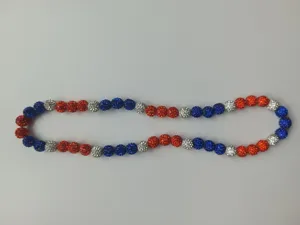 Detail showing 10mm red white and blue rhinestone disco ball beads on a necklace
