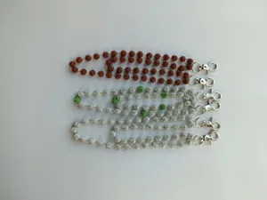 Detail view of sparkling rhinestone shamballa bead chains with metal clasps for chic accessories.