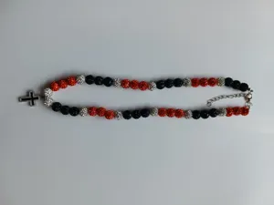 Detail view of the shamballa rhinestone bead necklace featuring a cross pendant and clasp.