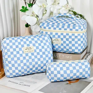 Blue and white checkered quilted cosmetic bag three-piece set showing different sizes