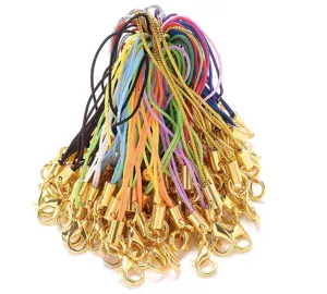 Colorful DIY jewelry lanyard ropes with gold lobster clasps, detailed close-up shot for charms.