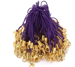 Detailed view of DIY lobster clasps with purple lanyards, ideal for phone charms and crafts.