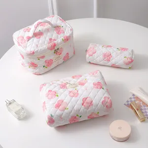 Three-piece set of cute floral quilted cotton cosmetic bags with soft fabric texture