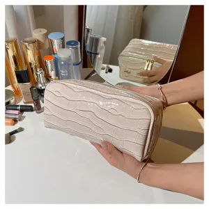 Elegant beige crocodile pattern large capacity cosmetic bag for travel and vanity storage