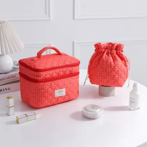 Professional quilted orange gingham makeup bag set with matching drawstring pouch
